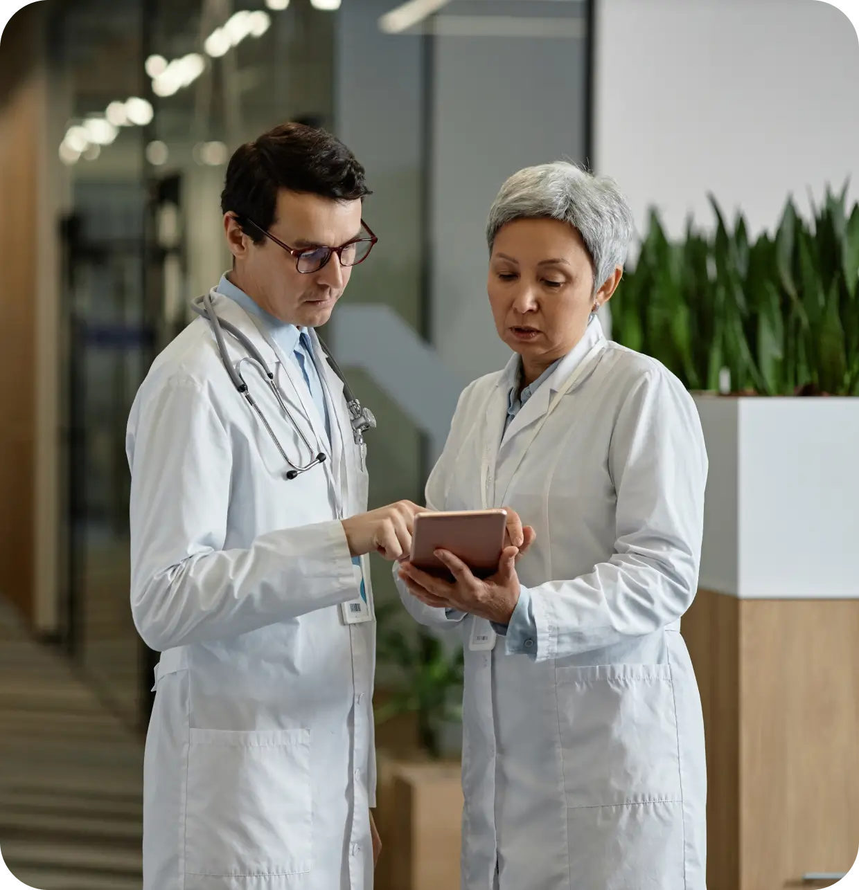 Medical professionals reviewing data together